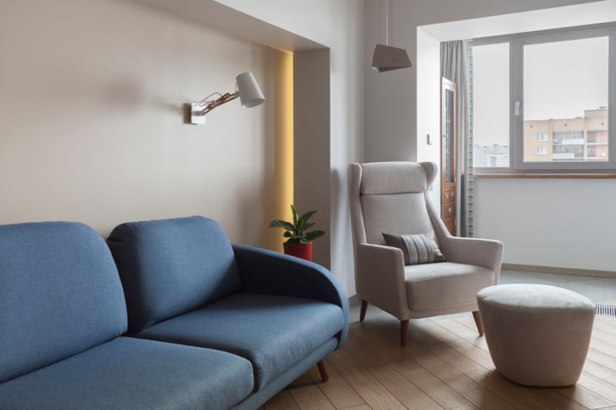 blue sofas in combination with an armchair