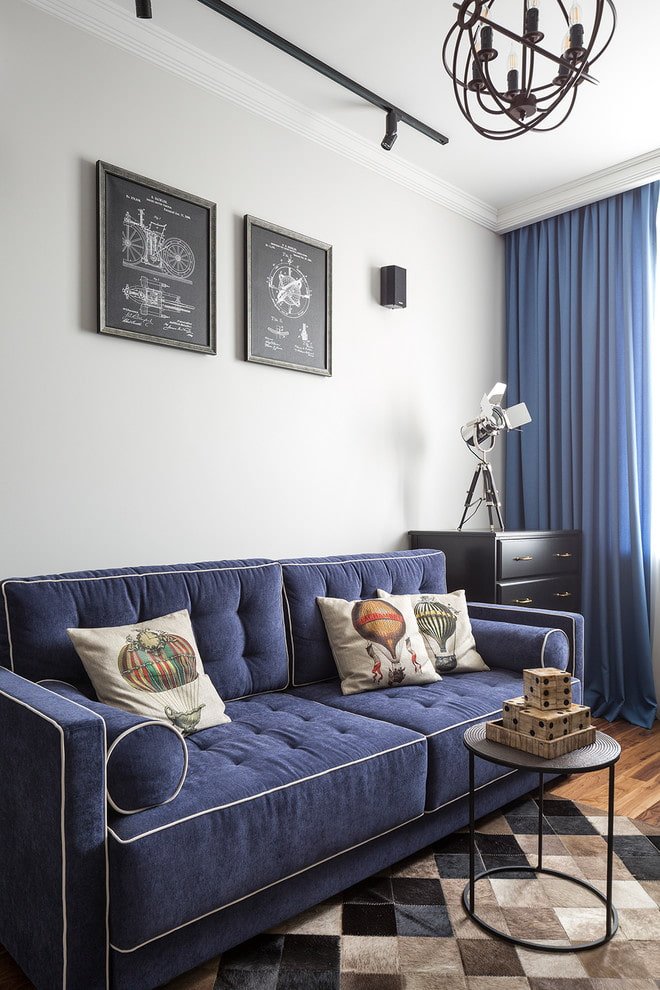 blue sofa with piping