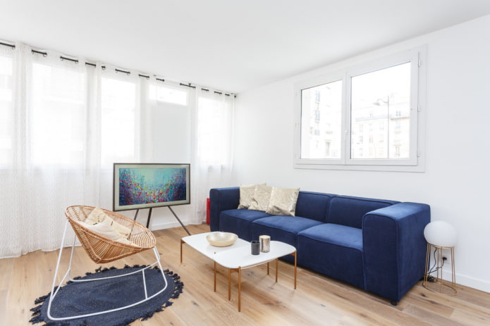 blue sofas in combination with the floor