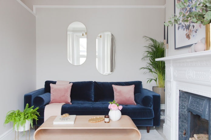 blue sofa in combination with pillows