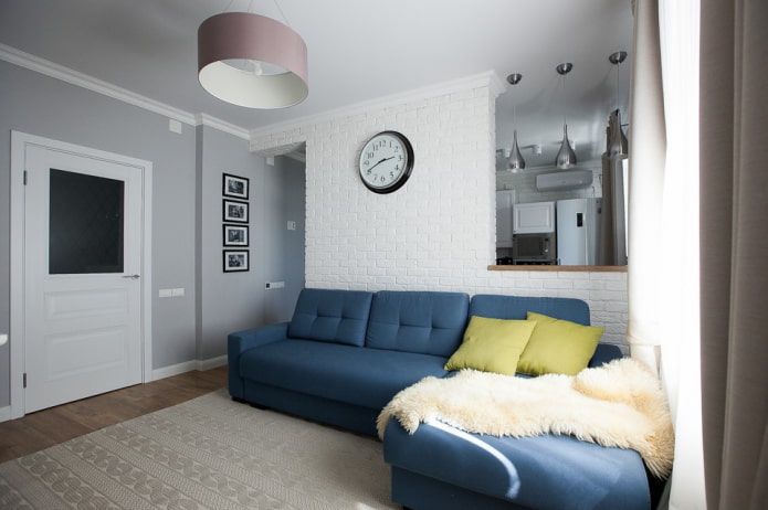blue sofa combined with a blanket
