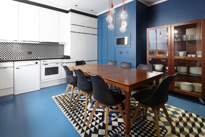 dining area in a kitchen interior in blue tones