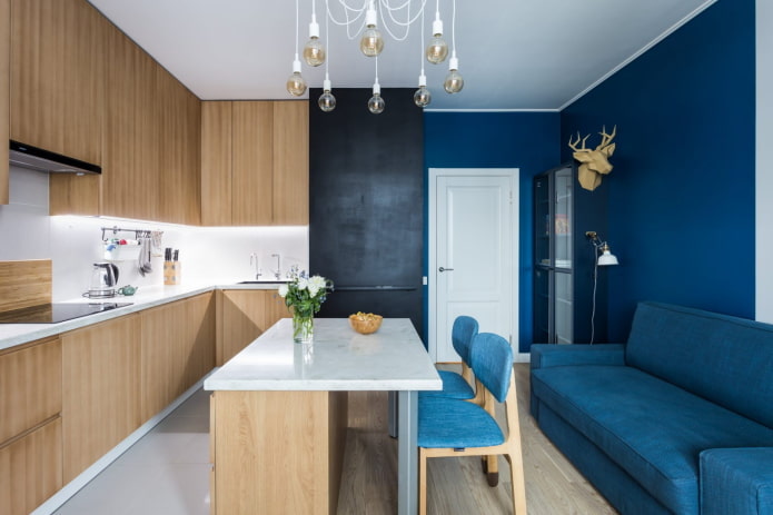 dining area in the kitchen interior in blue tones