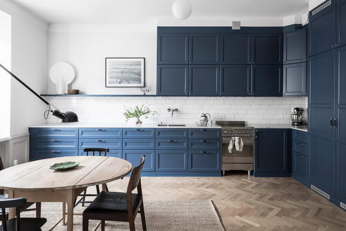 household appliances in the kitchen interior in blue tones