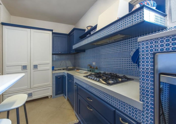 storage systems in the kitchen interior in blue tones