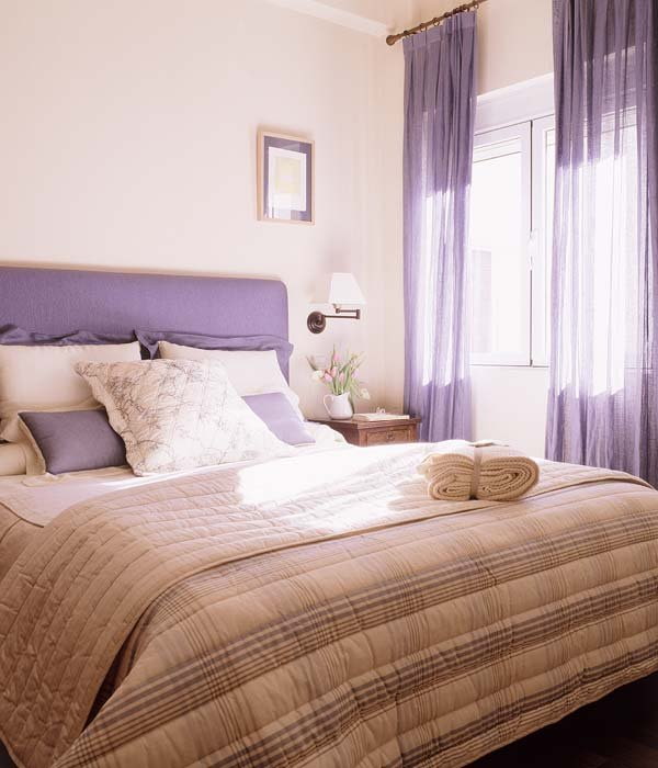 lilac curtains in the bedroom interior