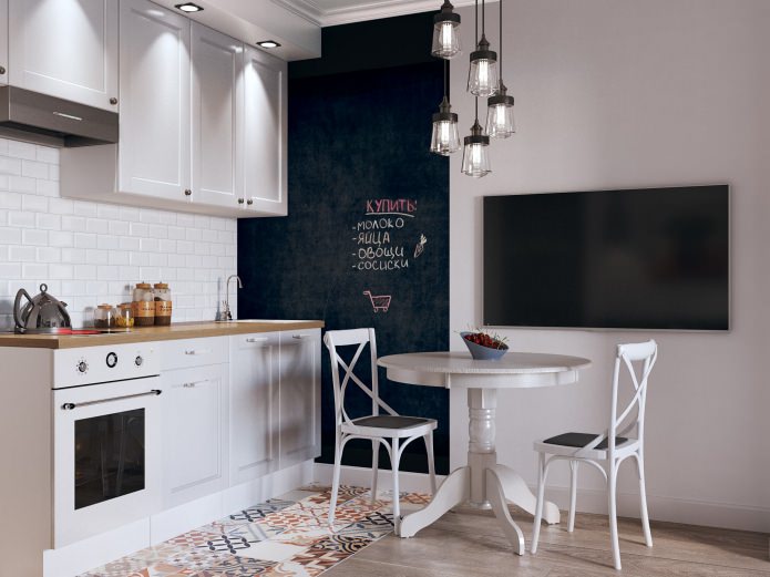 Kitchen interior in a 26 sq. m. studio apartment