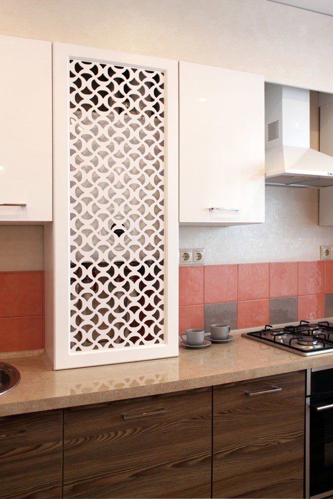 Column behind a perforated panel