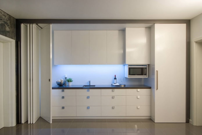 white hidden kitchen