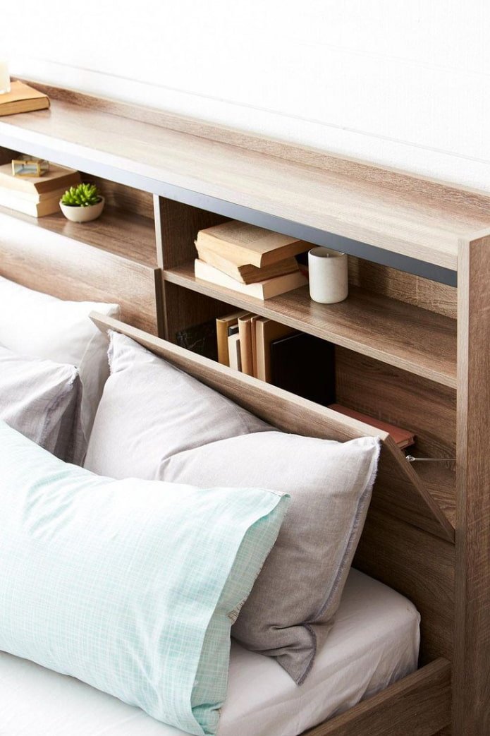 Hidden storage space in the bed