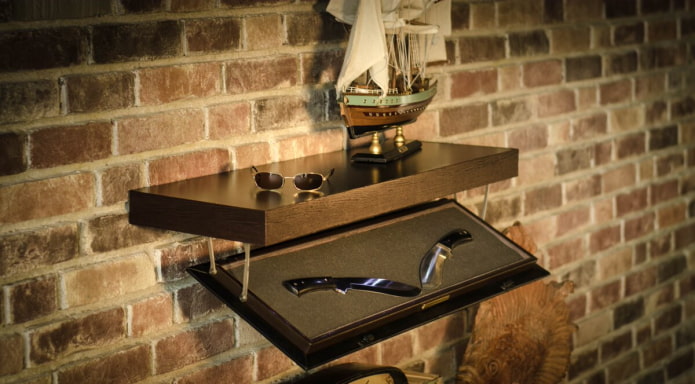 Shelf with a drop-down drawer