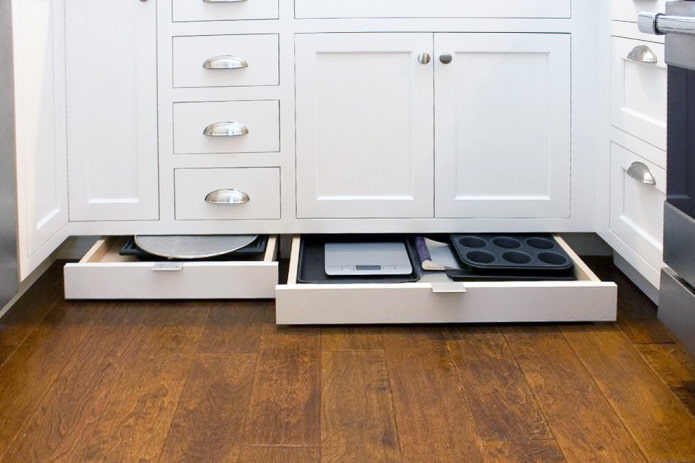 Storage in plinths