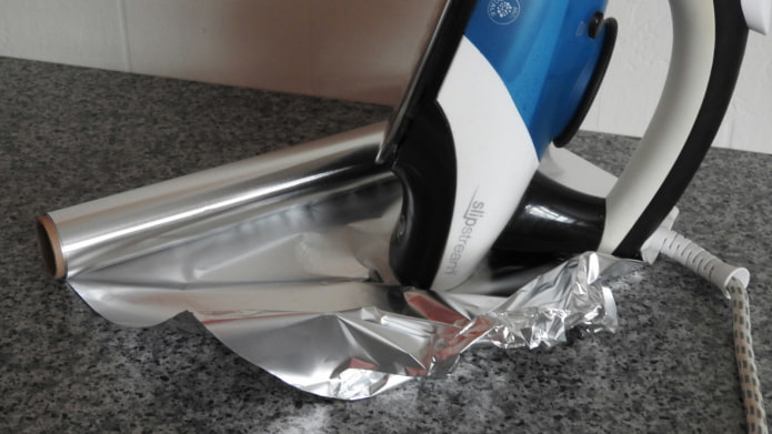 remove paint with an iron