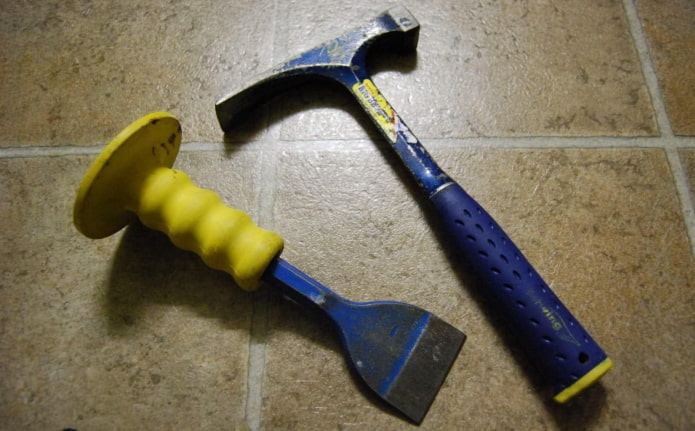 remove paint with a chisel