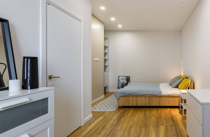 white doors and brown floor in the interior