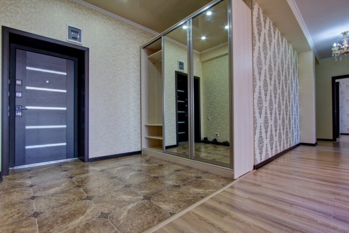 a combination of laminate and tiles in the interior of the hallway