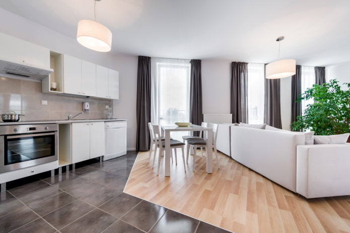 a combination of laminate and tiles in the interior