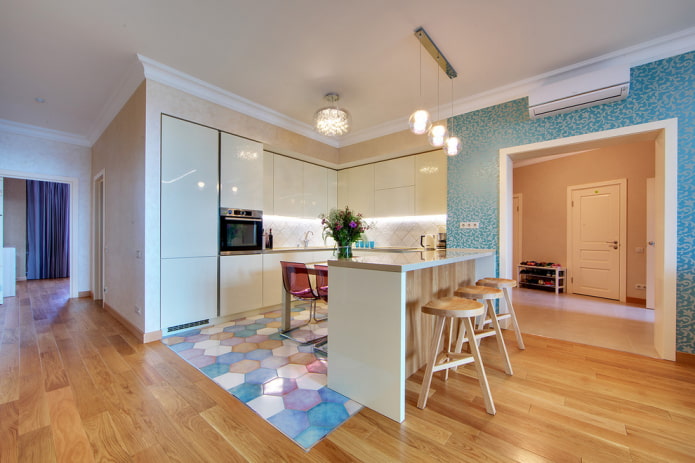 multicolored honeycomb tile finish combined with laminate flooring