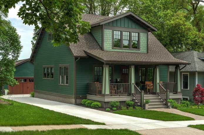emerald house with a gray roof