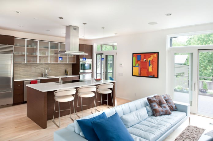 Combined kitchen-living room with a bar counter