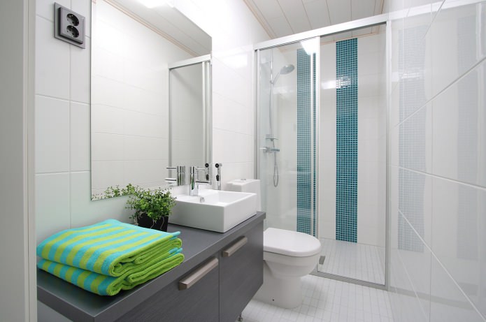 Design of a small bathroom with a shower cabin in a modern style