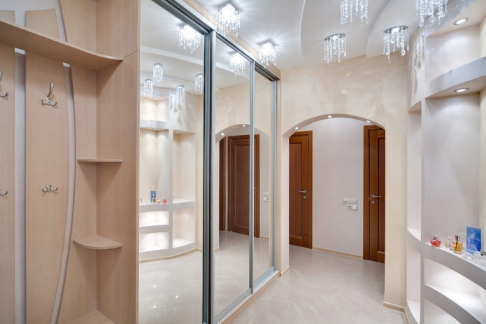 Hallway with a large mirrored wardrobe