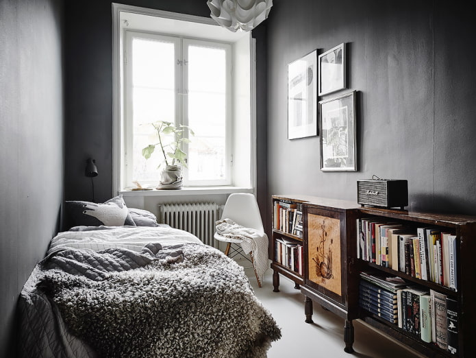 Dark interior of a small bedroom