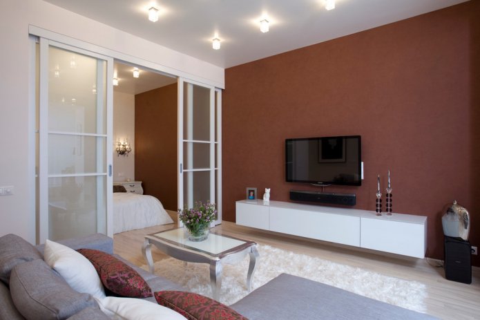 sliding partitions in the interior of the bedroom-living room