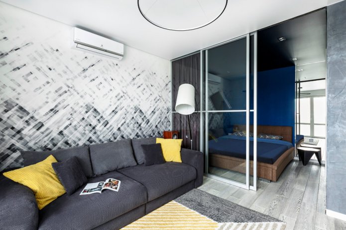 sliding partitions in the interior of the bedroom-living room