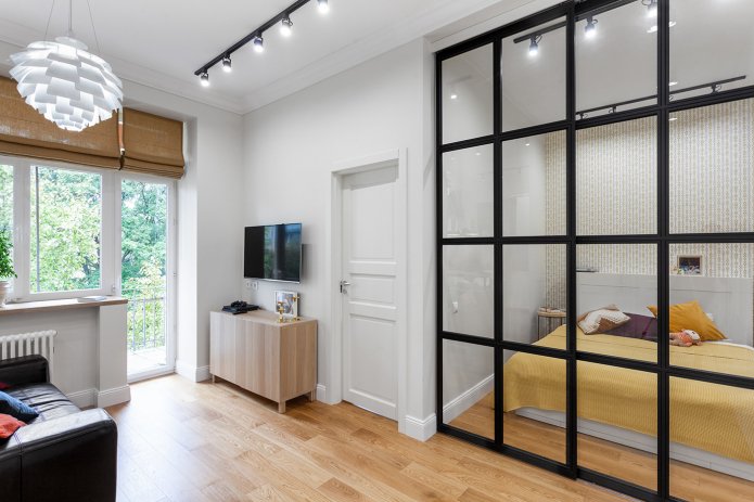 sliding partitions in the interior of the bedroom-living room
