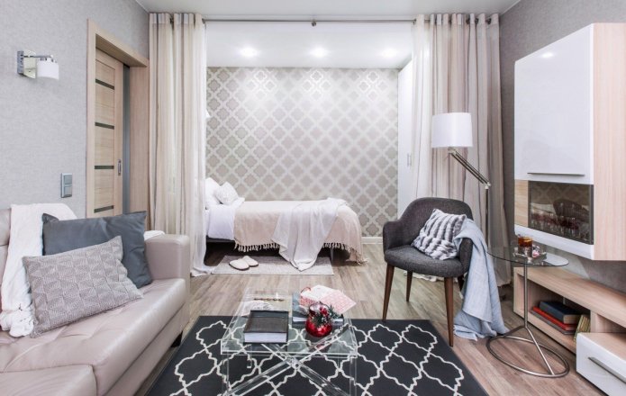 zoning with curtains in the interior of the bedroom-living room