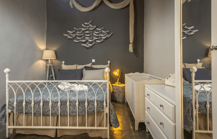 design of a small bedroom combined with a nursery