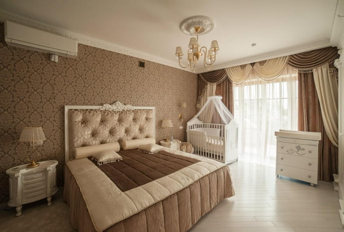 parents' area in a bedroom combined with a nursery