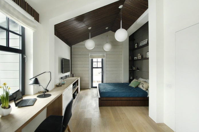 layout of an attic bedroom with a workplace