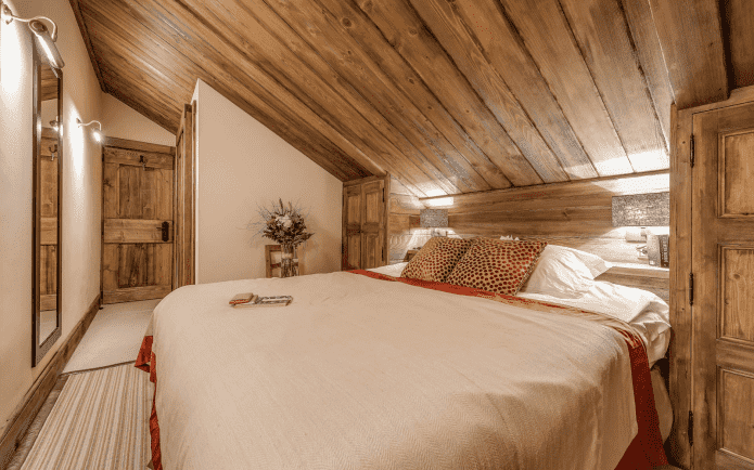 chalet style attic bedroom interior