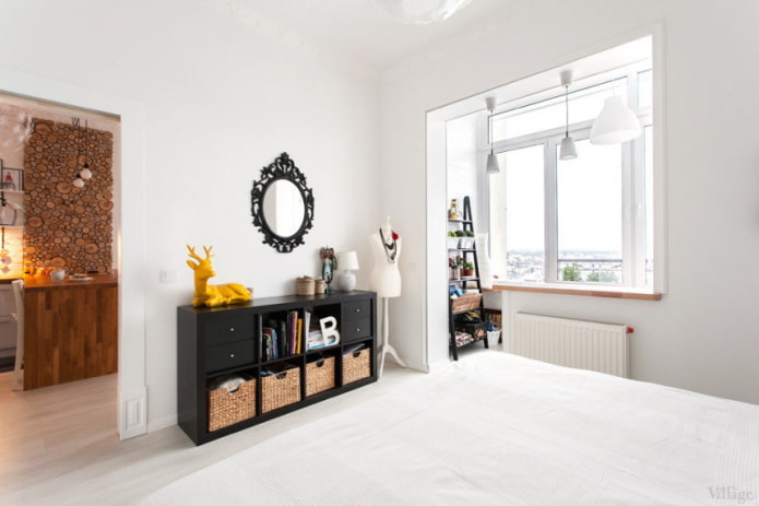 bedroom with a balcony in a Scandinavian style