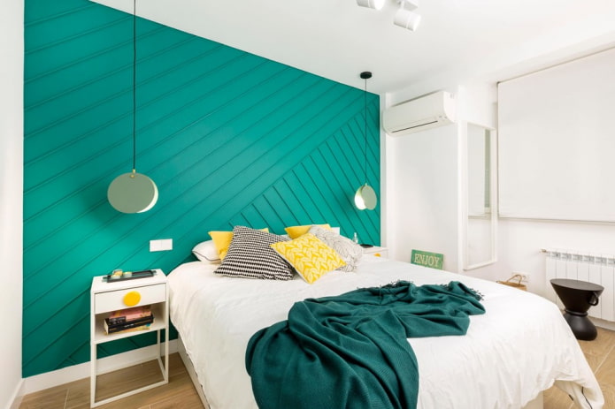 interior of a white and turquoise bedroom
