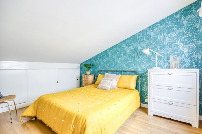 textiles and decor in a turquoise bedroom
