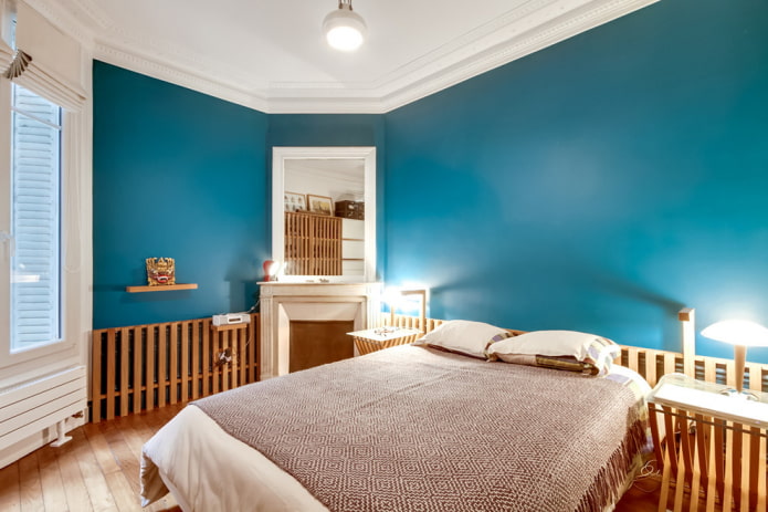 interior of a turquoise-brown bedroom