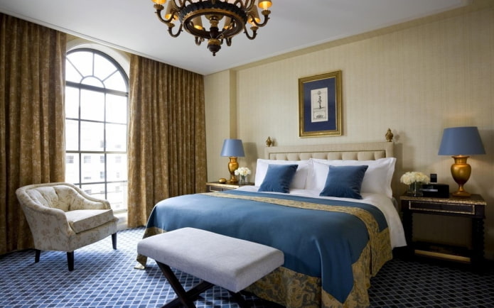 bedroom interior in gold and blue tones