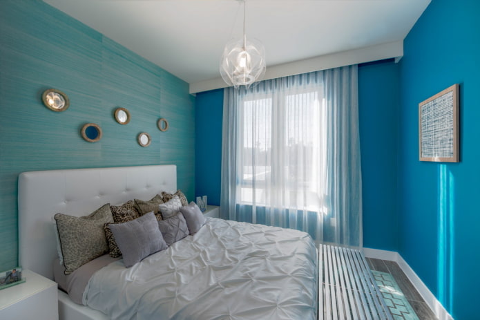 textiles and decor in the interior of a blue bedroom