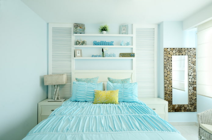 textiles and decor in the interior of a blue bedroom