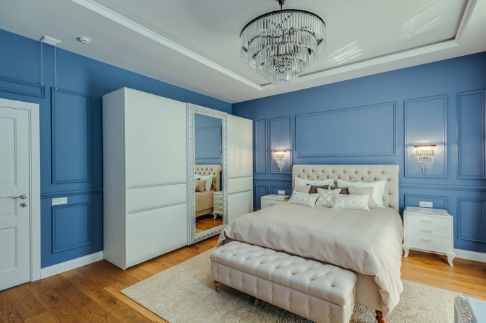 furniture in the interior of a blue bedroom