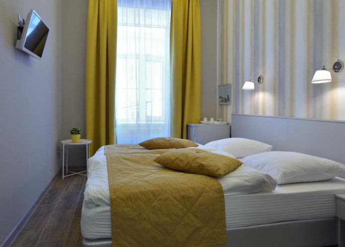 gray bedroom with bright accents