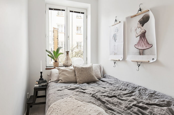 posters in a small bedroom