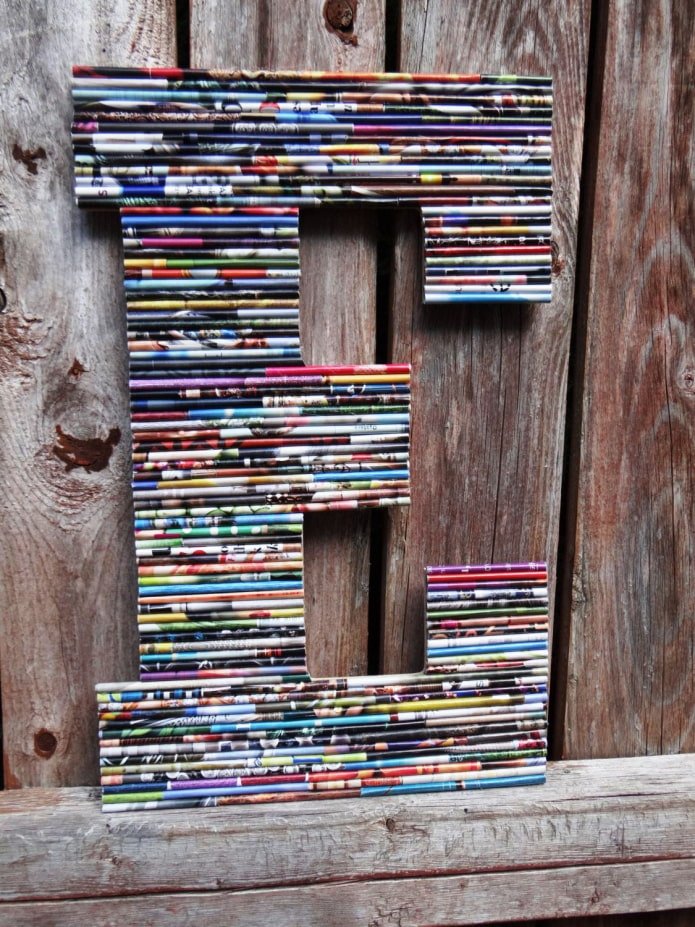 panel from magazine tubes letter e