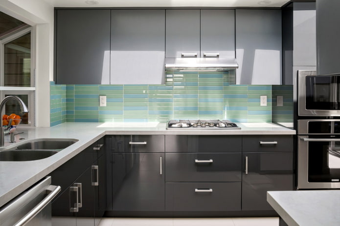 glass tiles on an apron against the background of dark facades