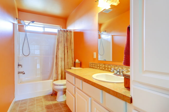 orange walls in the bathroom interior
