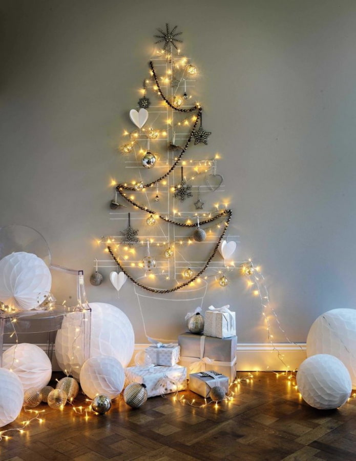 Christmas tree on the wall made of garland
