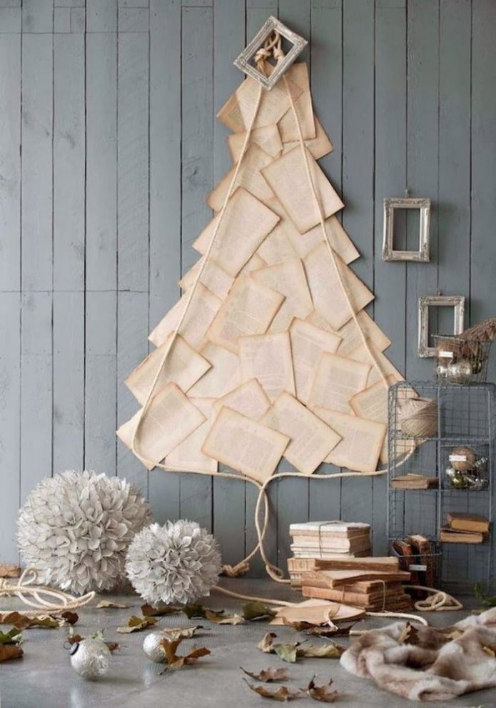 Christmas tree on the wall made of book pages